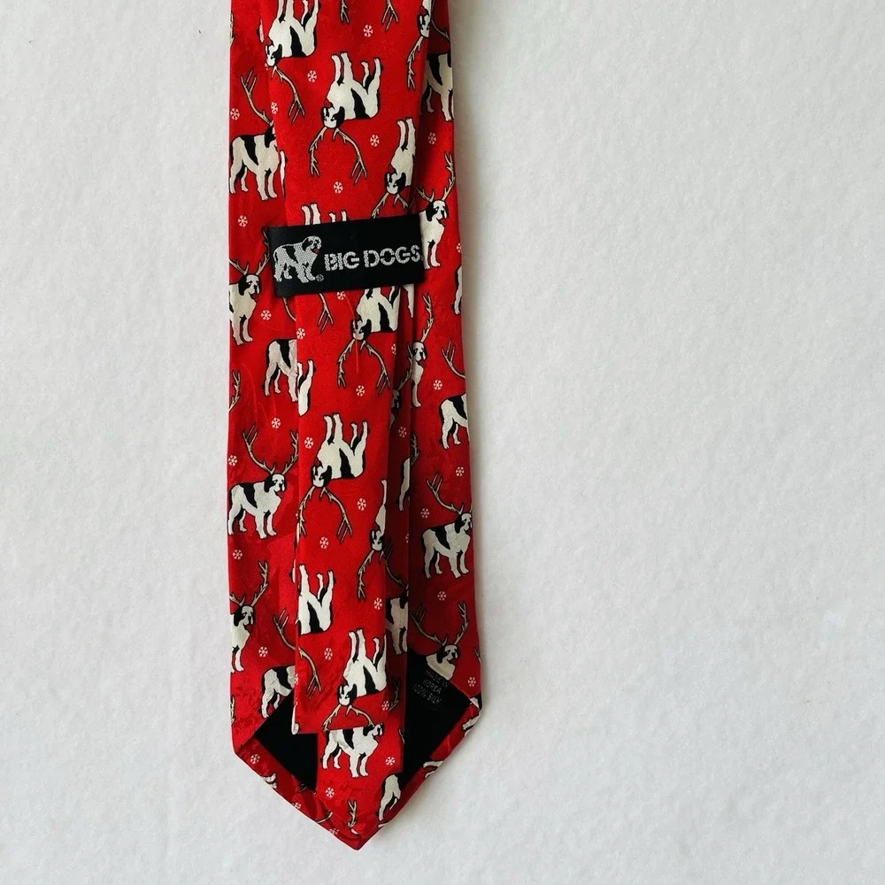 The Big Dogs 100% silk tie pattern of dogs wearing antlers on‎ a red background